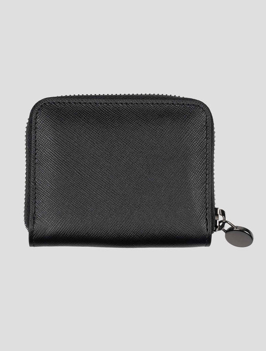Kiton black leather coin purse made from calfskin, featuring a sleek handmade design.