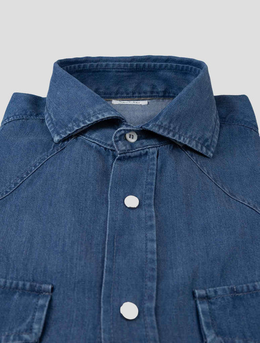 Brunello Cucinelli blue lyocell denim shirt for men, featuring a classic collar and button-up front.