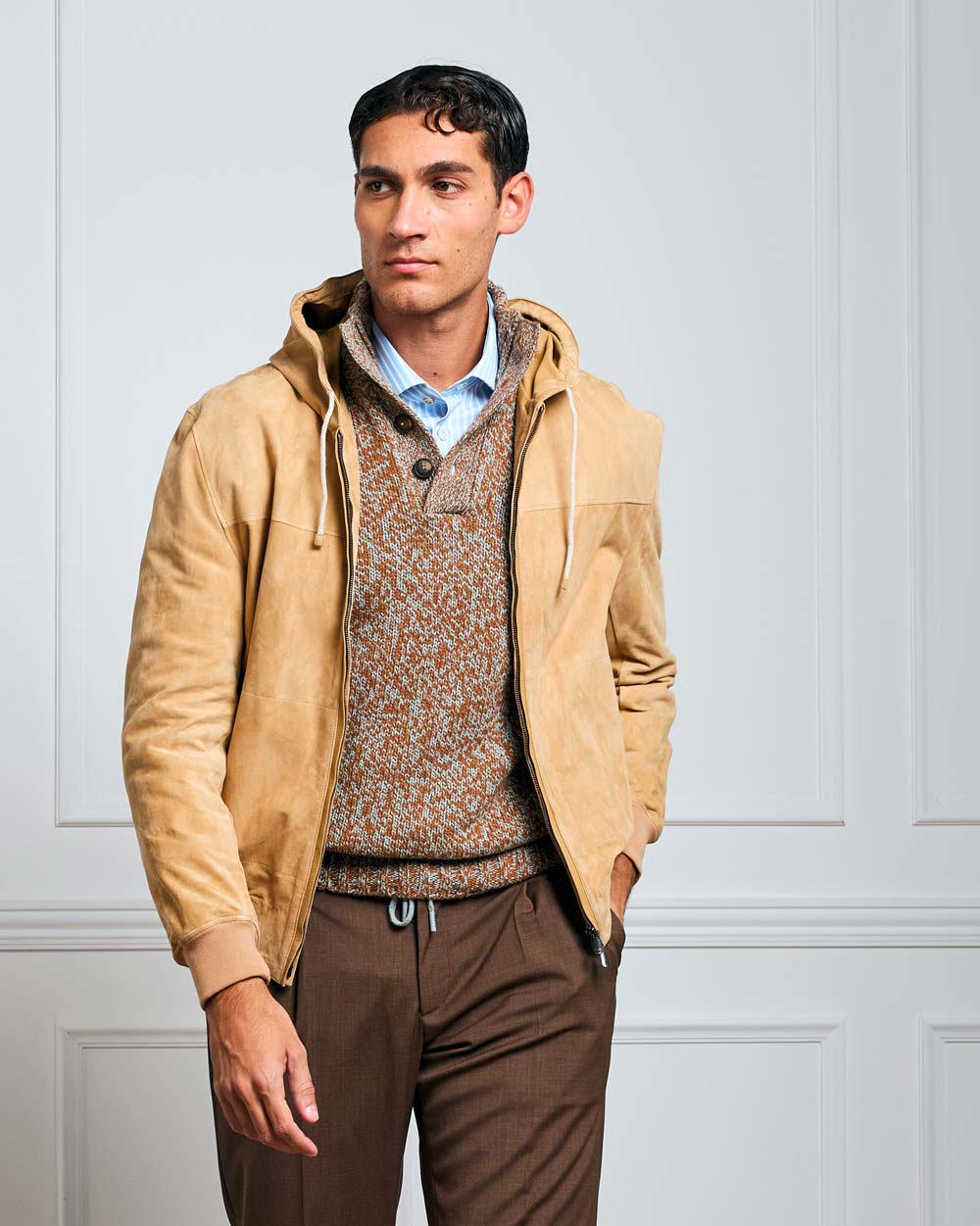 Kiton luxury Italian coat lifestyle image snow background