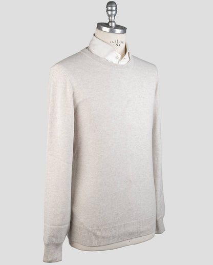 Jersey con cuello redondo en beige cachemir de Brunello Cucinelli